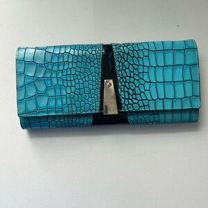 Luxurious Blue Textured Clutch with Glossy Finish